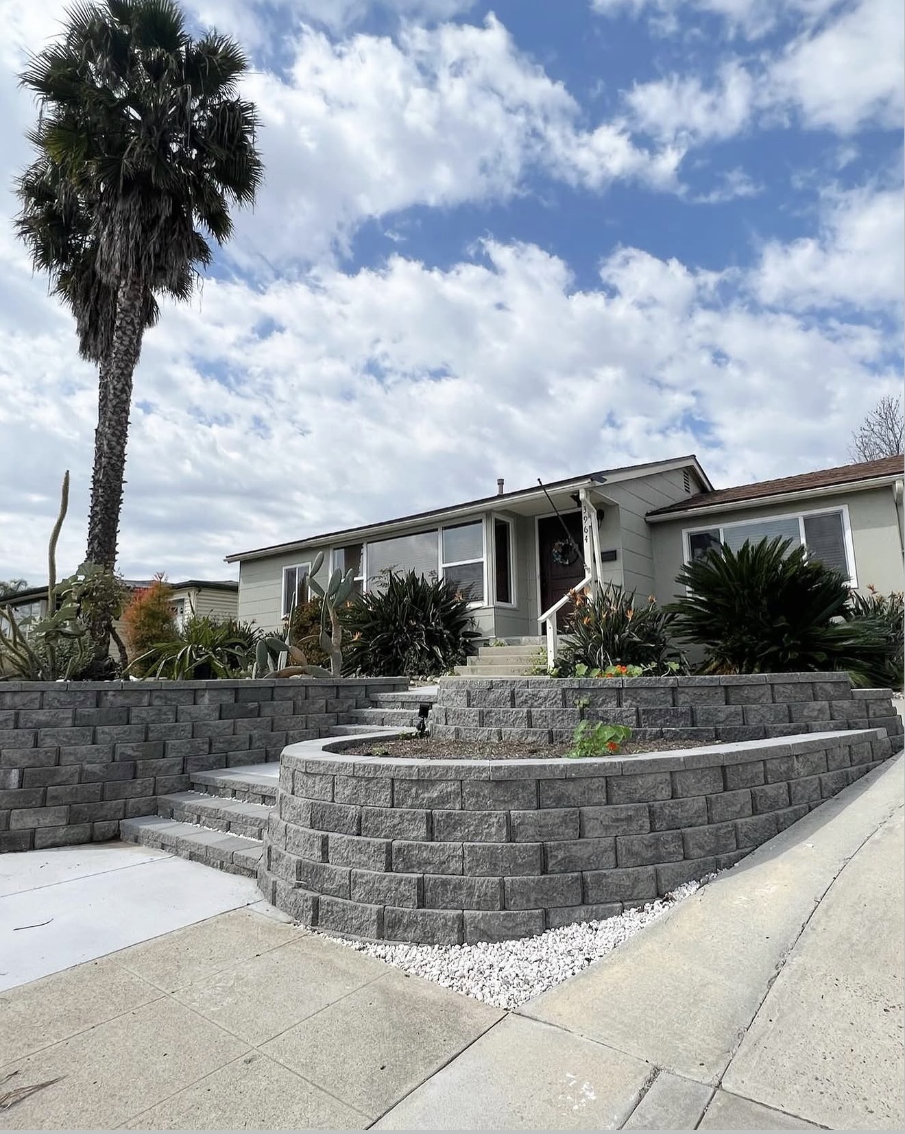 Gray Block Retaining Wall & Brick Stairs — completed project