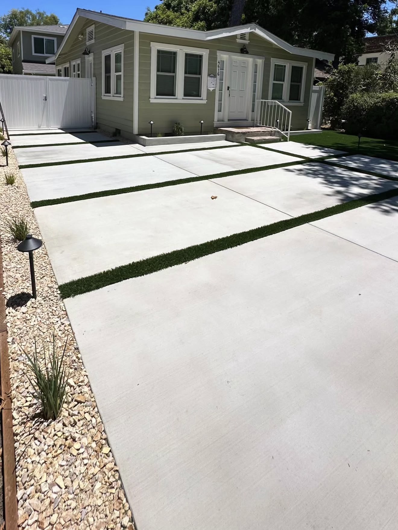 Concrete Driveway with Turf Inlay Strips — completed project