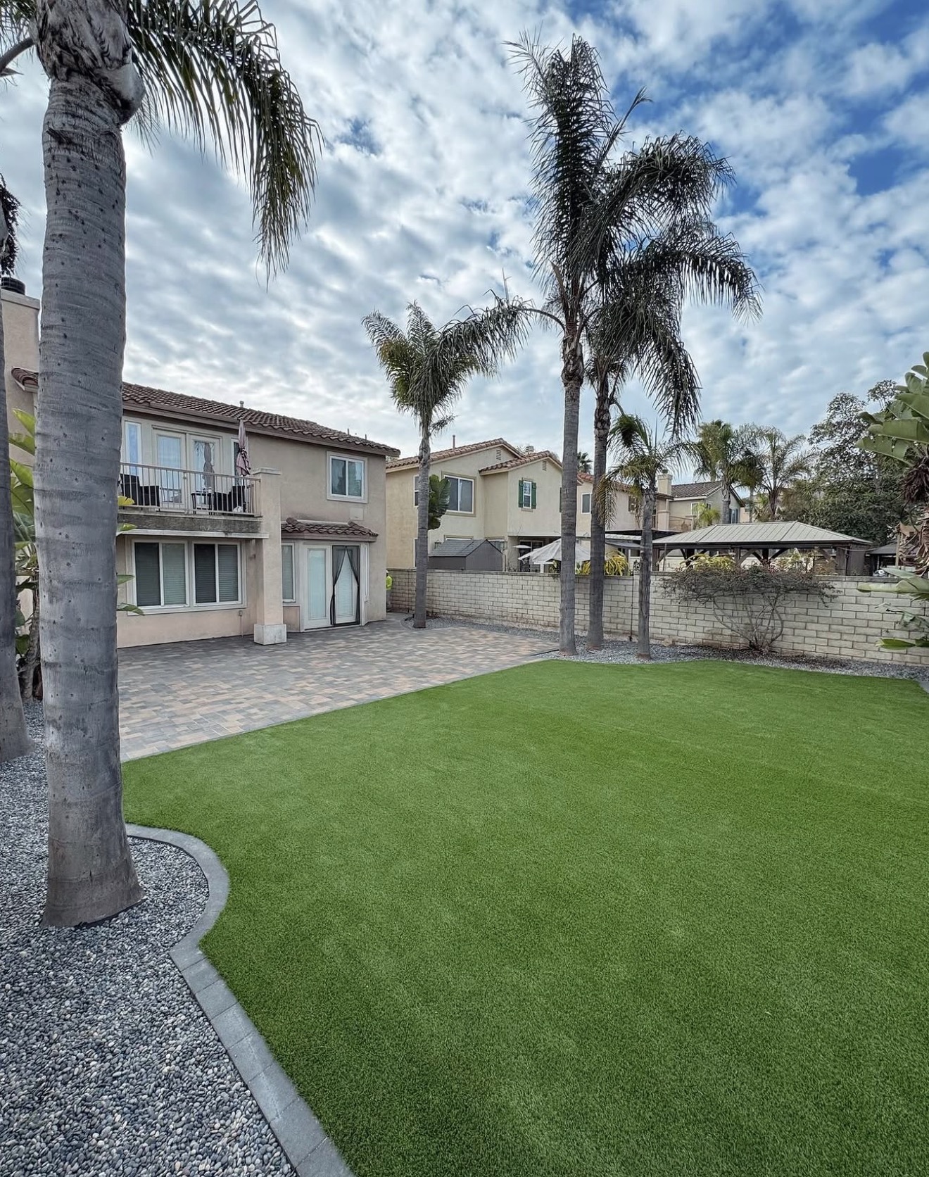 Two-Story Home Backyard Patio & Turf — completed project