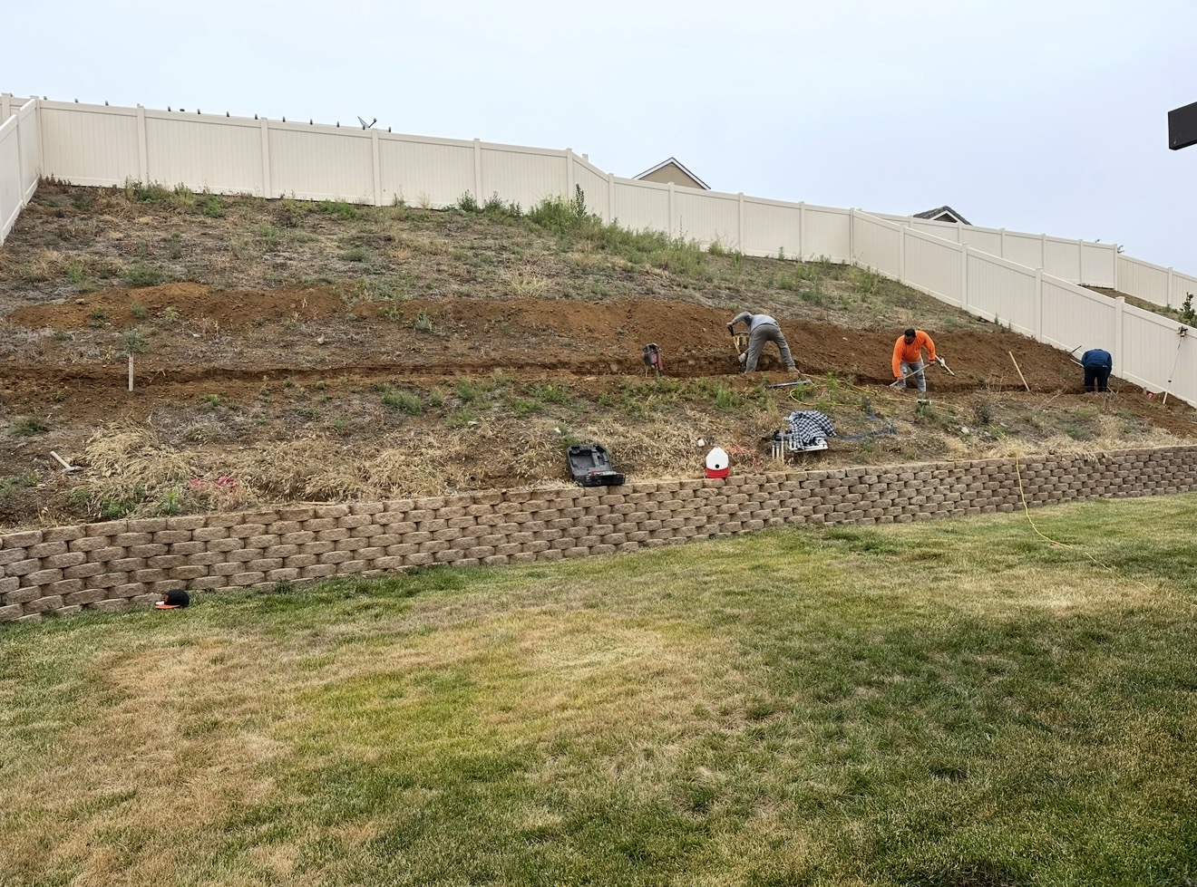 Multi-Tier Block Hillside Retaining Wall — before state